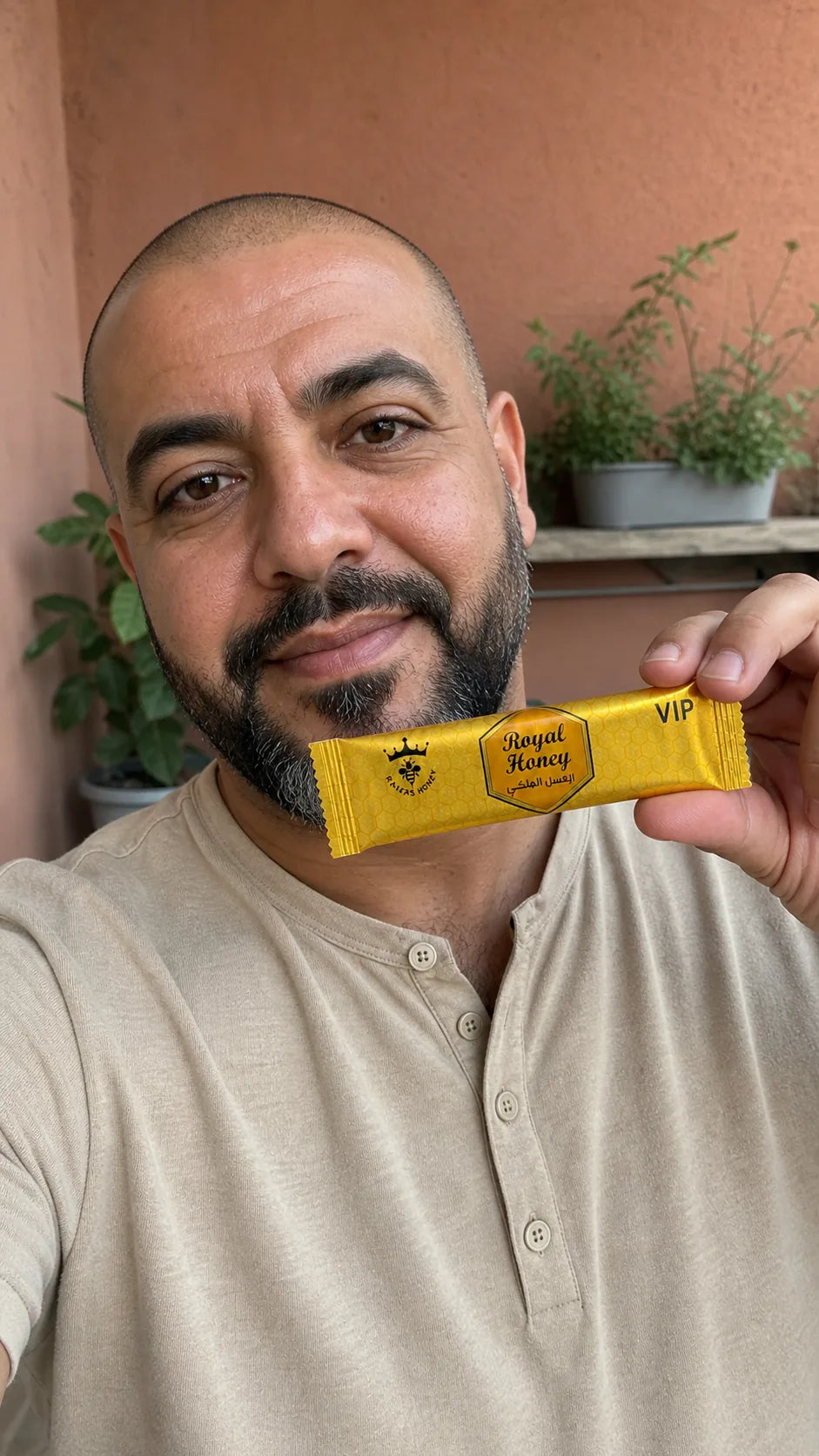 Royal Honey customer holding a sachet